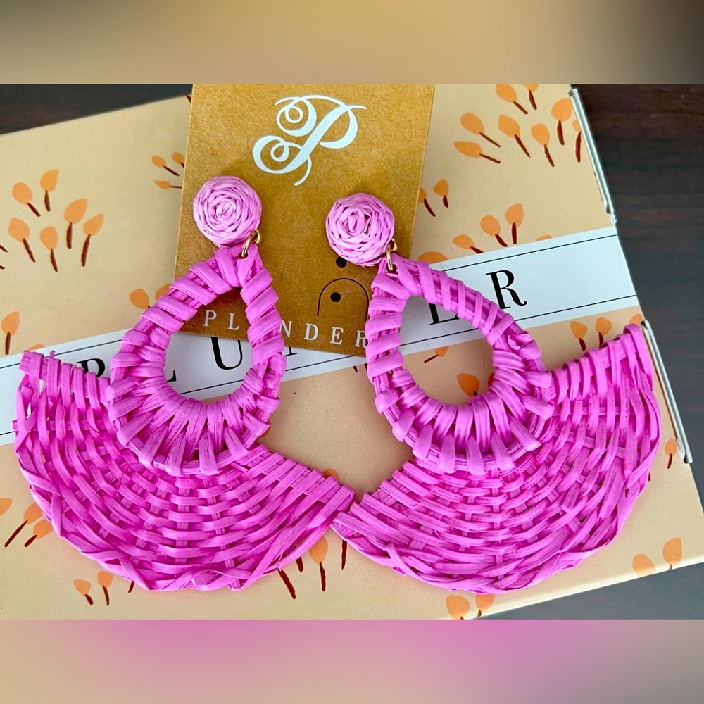 Pink plunder earrings.